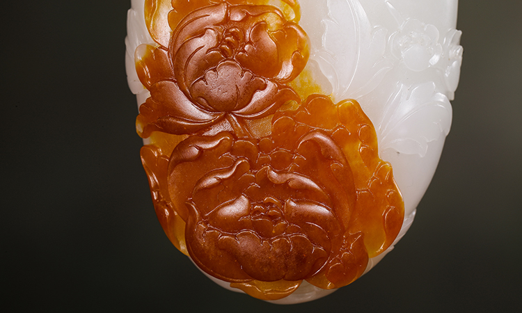 一紅二黃三羊脂，紅皮籽料的地位為何這么高？