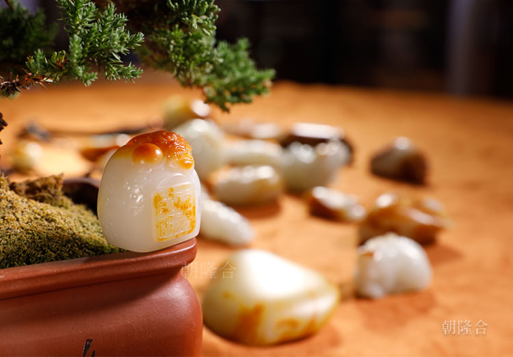 一玉隨身，二玉盈屋，三玉傳家